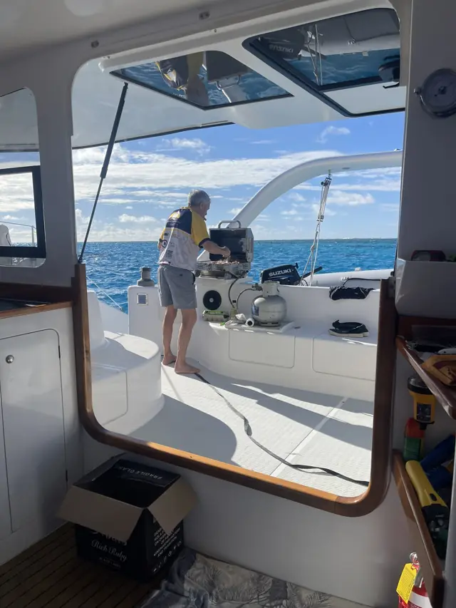 Cockpit life at sea with the transom open