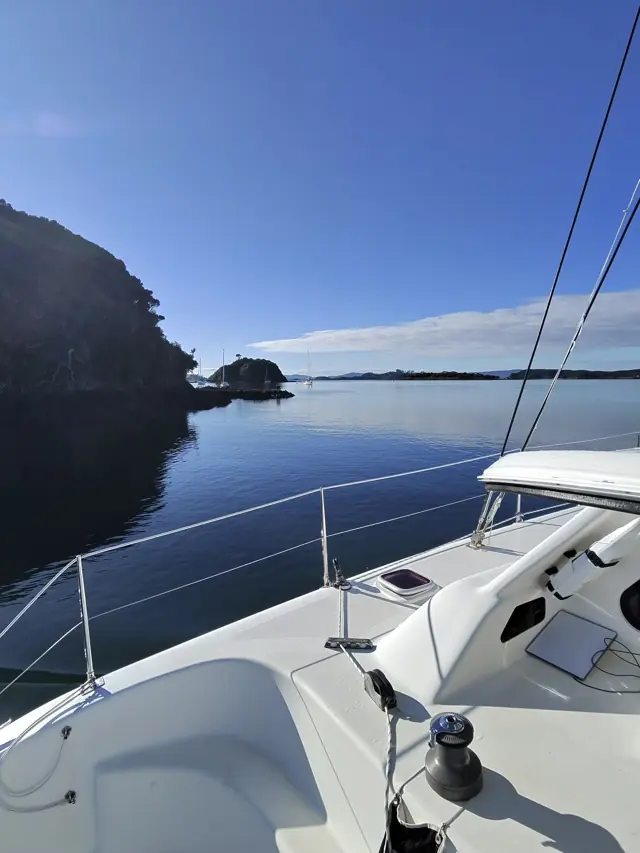 Entering a new anchorage past a headland