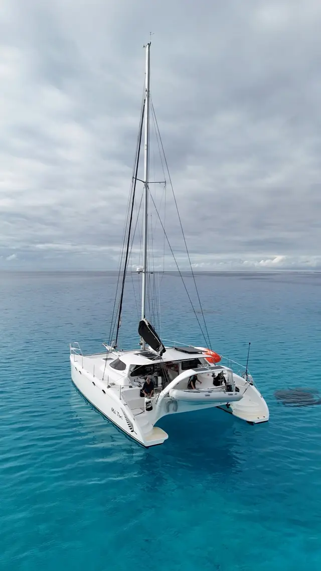 Bow-on aerial of the Fusion 40 in crystal clear turquoise water